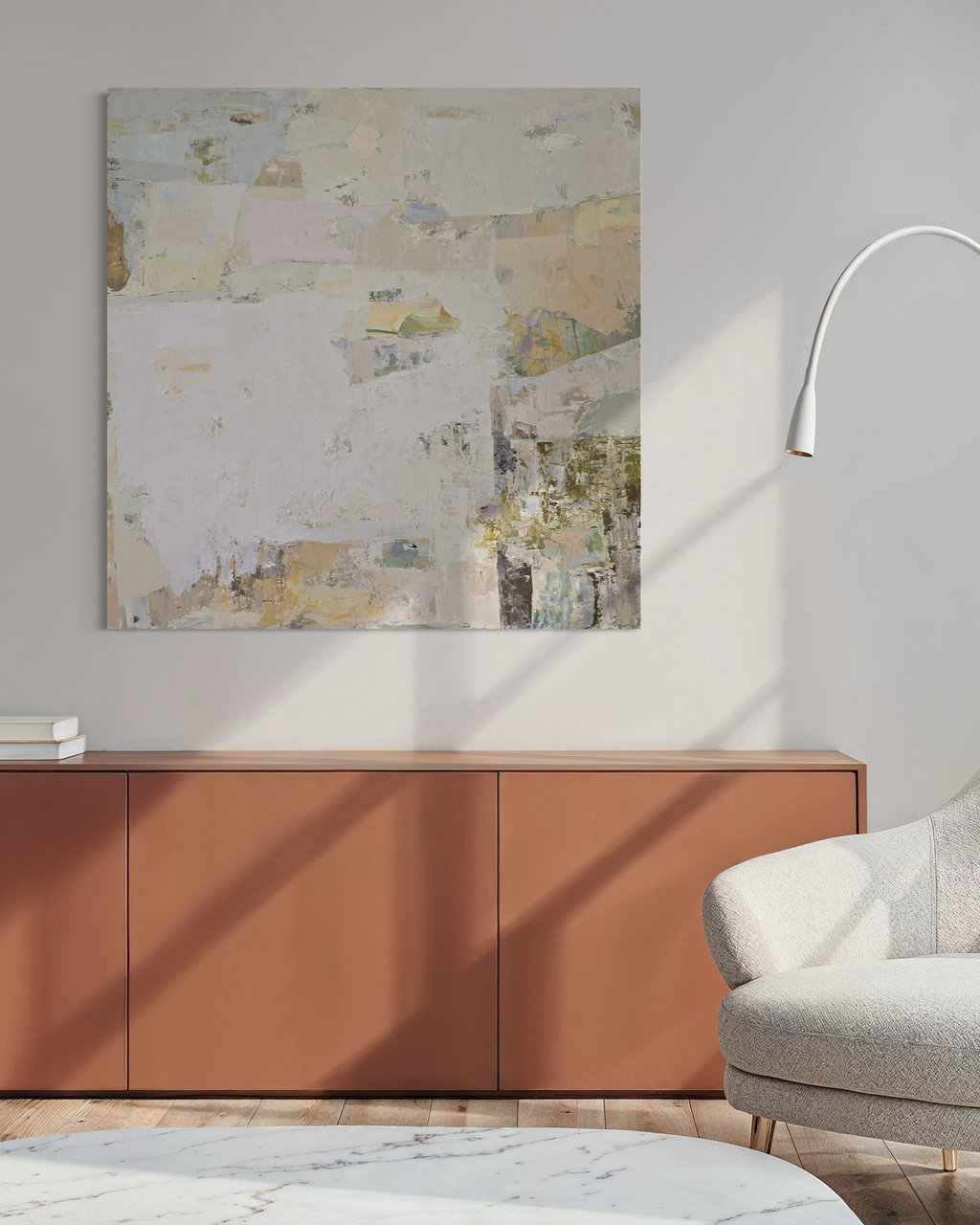 An abstract canvas painting featuring a textured, layered composition of off-white, beige, and soft pastel tones | Birute Studio